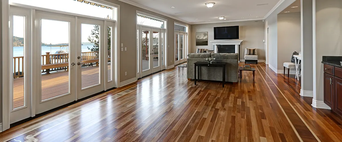 A living room with refinished hardwood floor