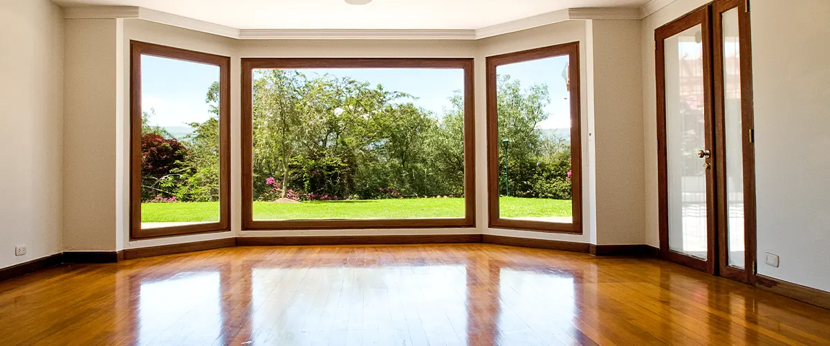 An empty sunroom with a great wood finish