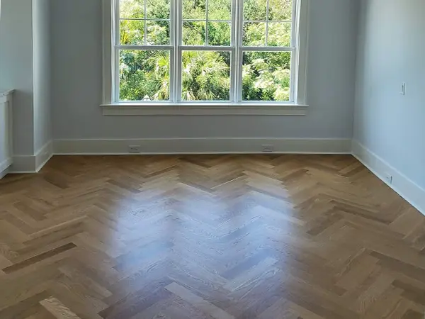 Hardwood floor refinishing in bedroom