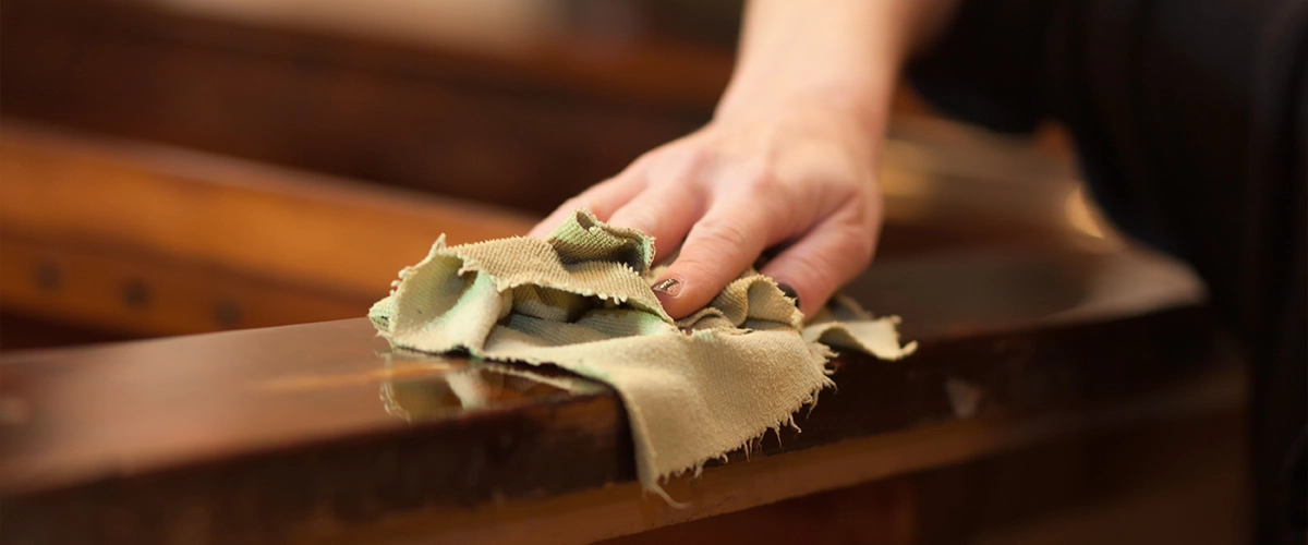 Cleaning wood with a dry cloth