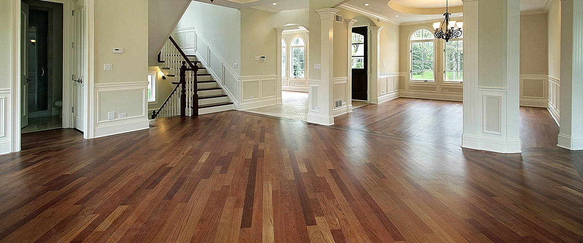 An empty home with hardwood flooring