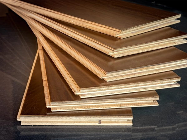 Several engineered hardwood boards stacked together