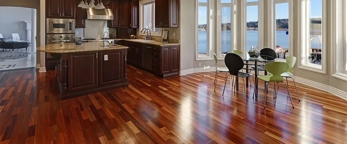 An open space kitchen with hardwood floor