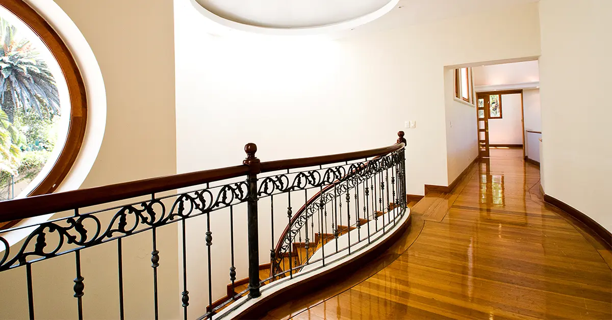 Shiny hardwood floor in a second story house after floor refinishing