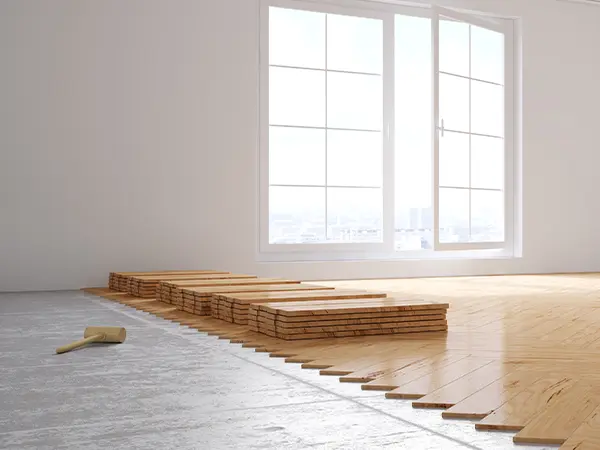 Wood flooring installation in empty room