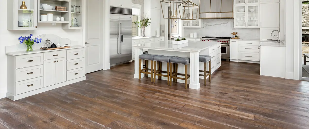 Dated wood floors in a kitchen