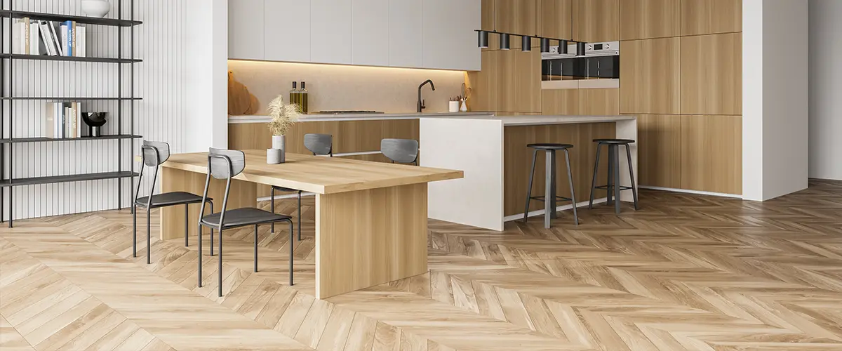 A hardwood floor in a kitchen