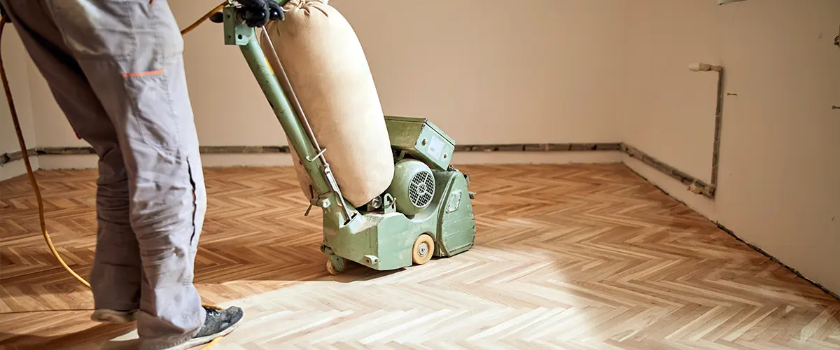 Floor sanding with a heavy machine