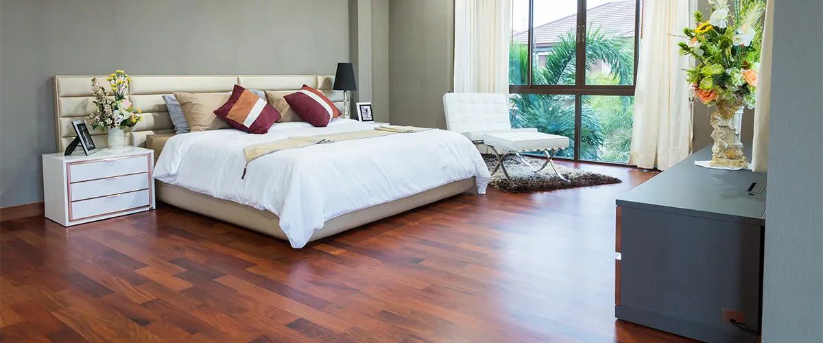 furniture on refinished wood floors in bedroom