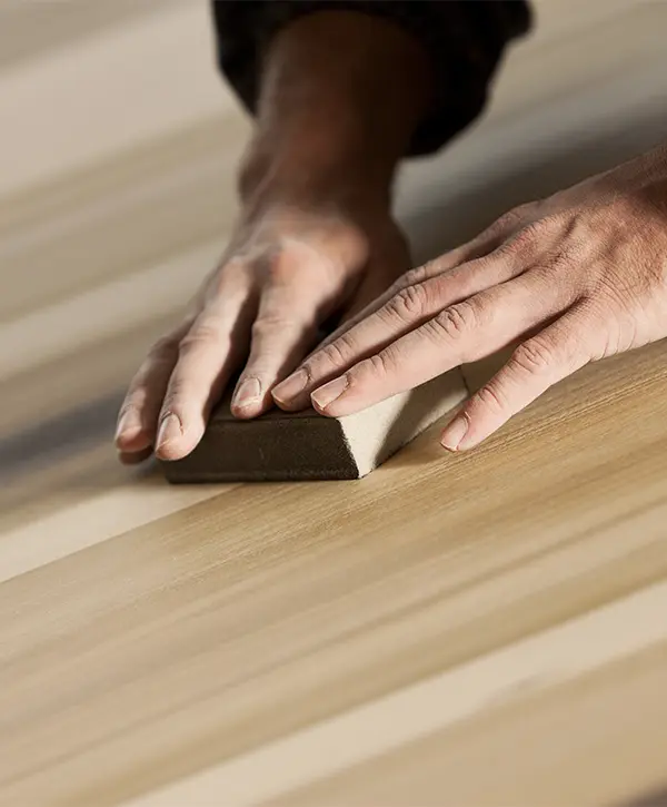 Refinishing a wood floor by hand