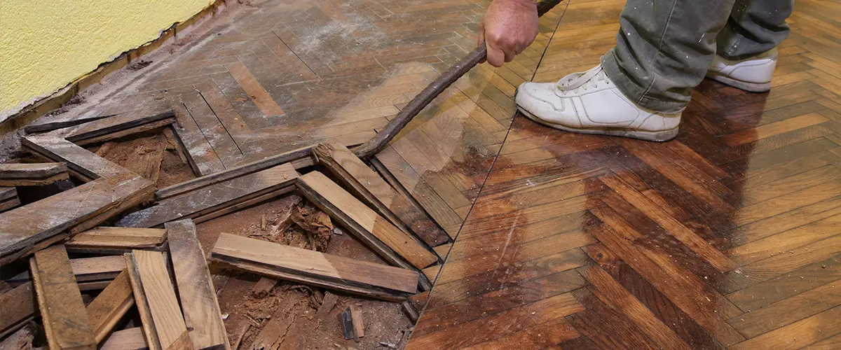 Contractor replacing dated wood floors