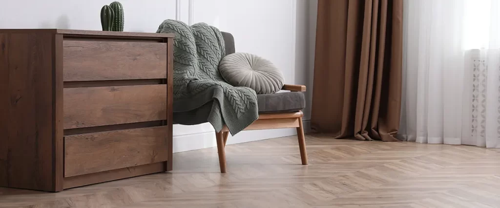 Cozy living room with herringbone LVP flooring